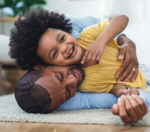httpselements.envato.comhappy-african-family-dad-hugging-embracing-his-lov-3DNQ7M6-1.jpg